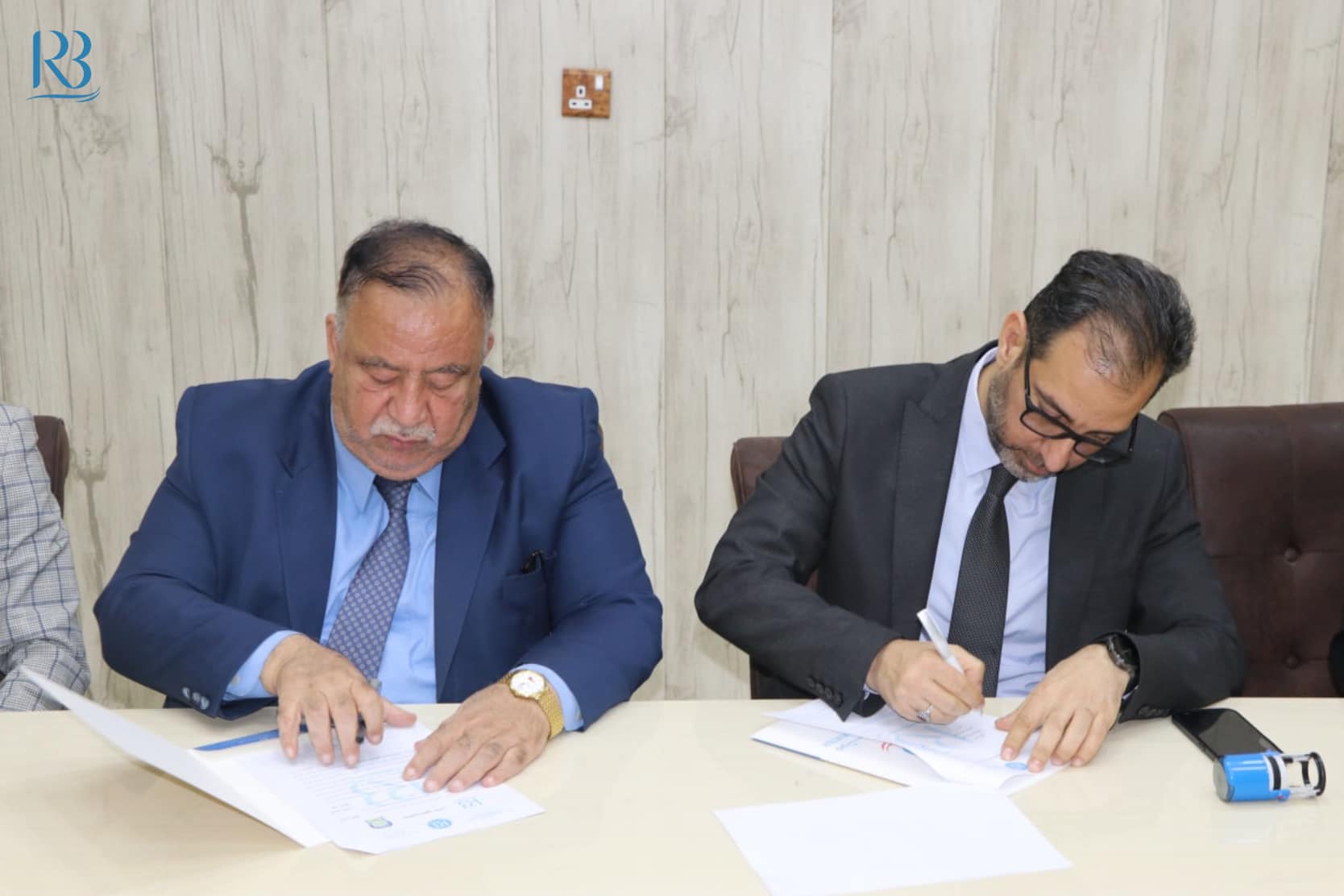 The head of Rewaq Baghdad Center, Mr. Abbas Al-Anbouri, signed a cooperation agreement with the head of the National Forum for Research in Thought and Culture, Professor Dr. Abdul Amir Kadhim Zahid